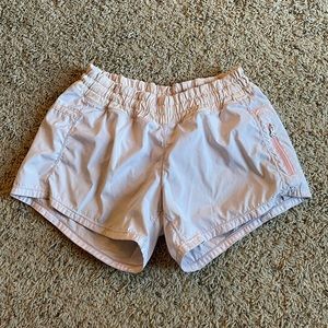 Pink lululemon track that shorts
